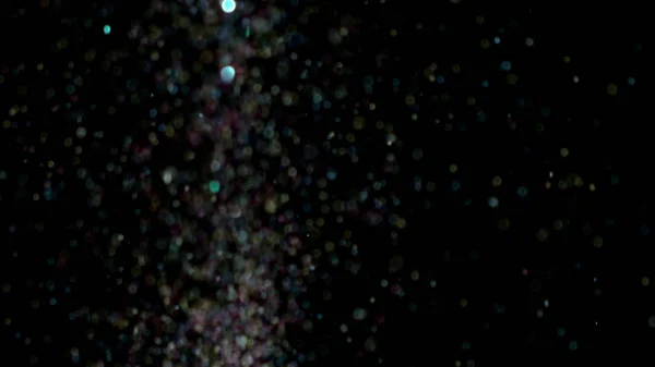 Realista Glitter Explodindo em fundo preto . — Fotografia de Stock