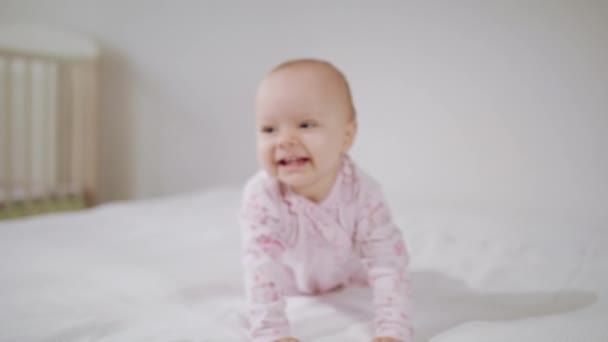 Baby Crawling on All Fours on the Bed — Stock Video