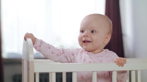 Baby Standing in a Crib at Home — Stock Video