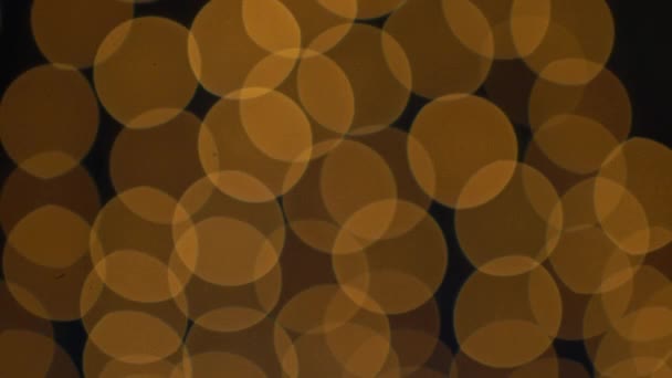 Goldene Bokeh-Lichter blinkender Hintergrund — Stockvideo