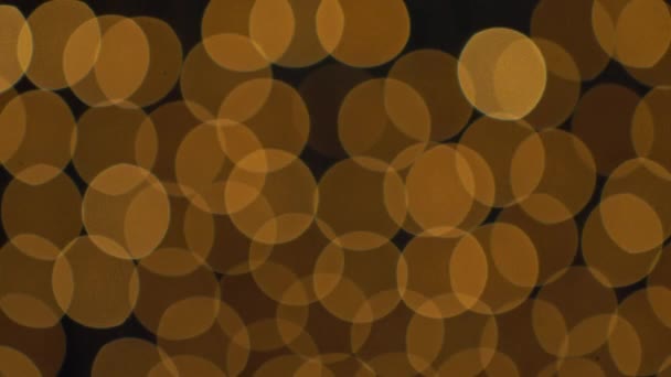 Goldene Bokeh-Lichter blinkender Hintergrund — Stockvideo