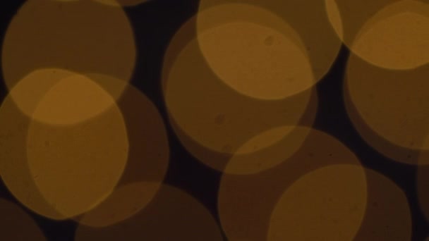 Goldene Bokeh-Lichter blinkender Hintergrund — Stockvideo