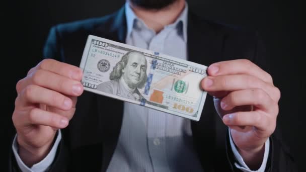 A Man in Black Jacket and White Shirt Holding Cash — Stock Video