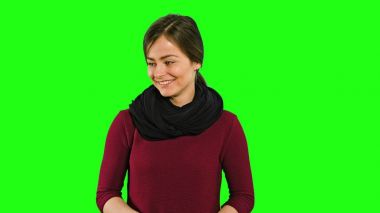 Bir Astonished Bayan gülen ve parmağını sallayarak