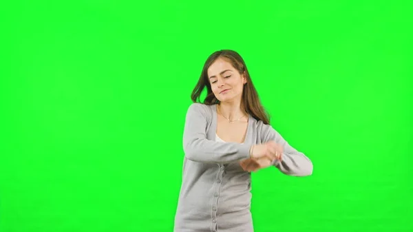 Vrouw dansen groene Chroma Key schermachtergrond — Stockfoto