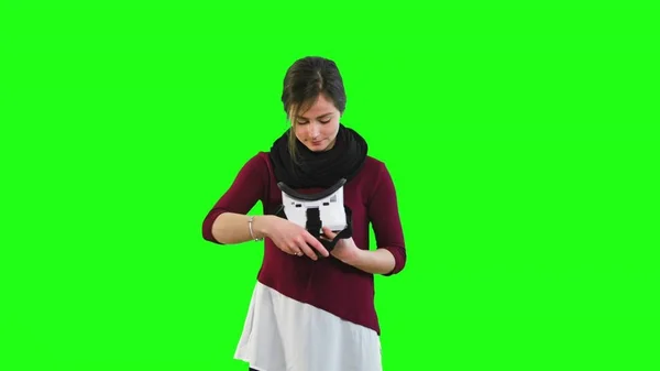 Woman Puts Down Virtual Reality Glasses