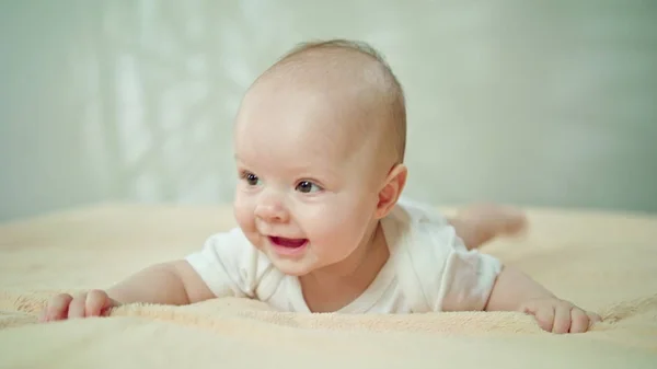 Baby Lying on Stomach on a Soft Linen — Stock Photo, Image