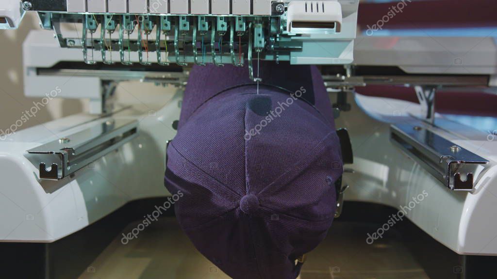 Embroidery machine deals logo on the cap dolly shoot