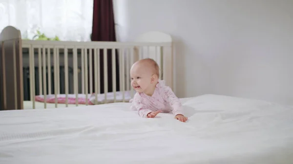 Baby Crawling on All Fours on the Bed