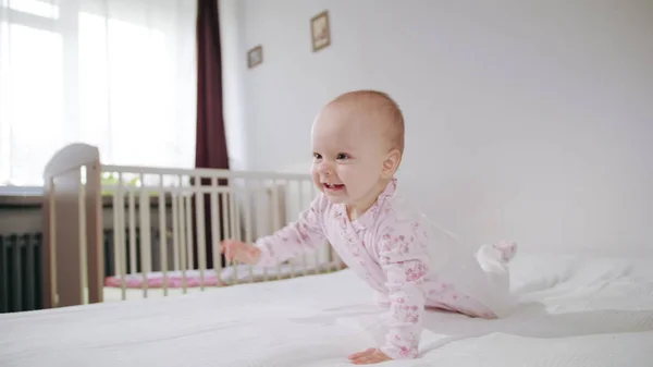 Baby Crawling on All Fours on the Bed