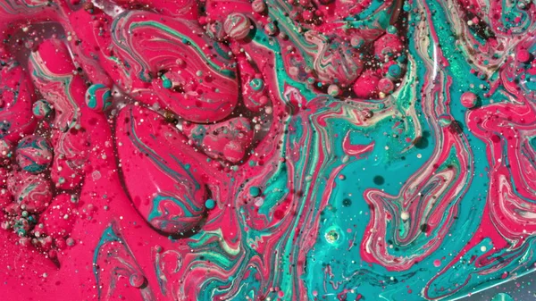 Tinta de aceite de cámara lenta burbujas de colores brillantes — Foto de Stock