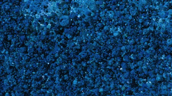 Яскраві кольори бульбашки повільний рух олії чорнило — стокове фото