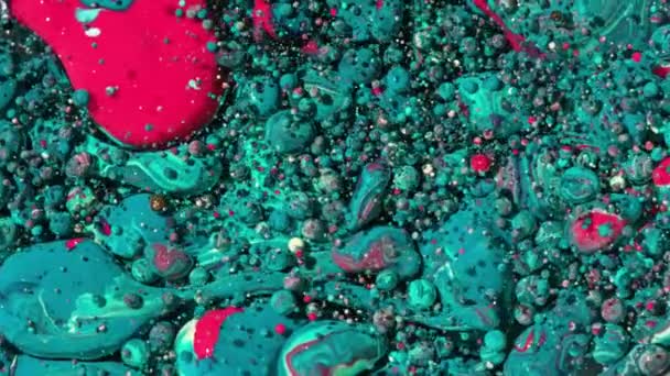 Heldere puzzleachtige bubbels Slow Motion olie inkt — Stockvideo