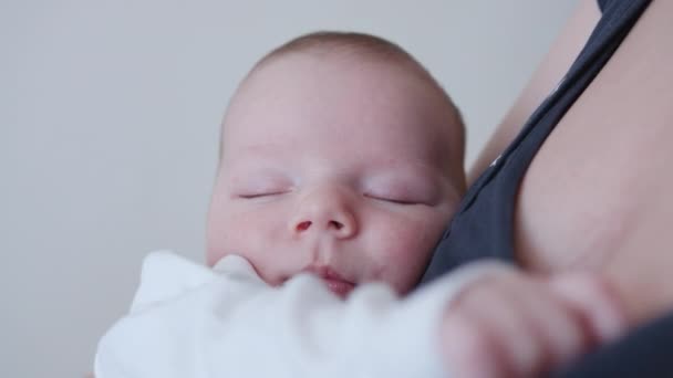 Young Mother Holding Her Baby — Stock Video