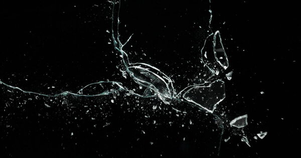 Broken cracks glass fracture effect texture isolated abstract black background. Bullet cracked window with big hole screen mirror weapon shot.