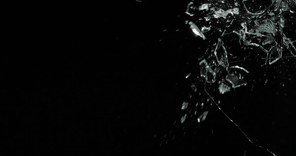 Broken cracks glass fracture effect texture isolated abstract black background. Bullet cracked window with big hole screen mirror weapon shot.