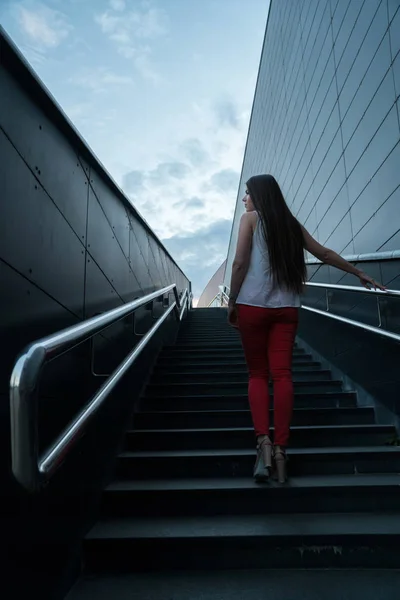 Young fitness woman running on mountain stairs — Stock Photo, Image