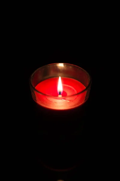 The red Candle with Dark Background