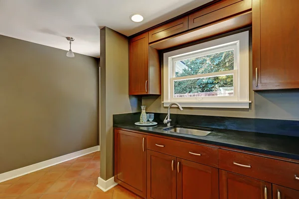 Kitchen mahogany cabinets with a sink. House interior — Stock Photo, Image