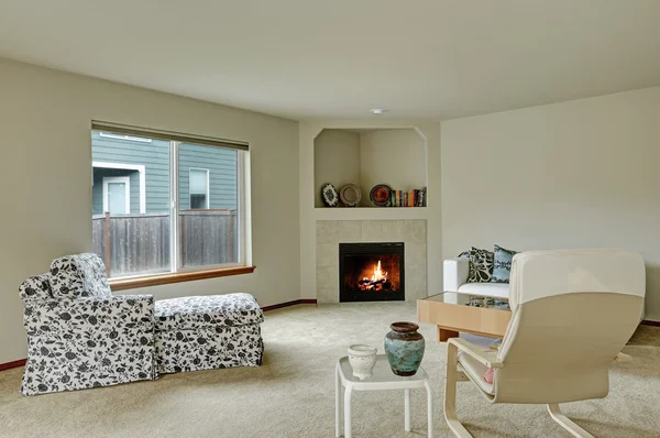 Light tones elegant living room with fireplace in the corner. — ストック写真