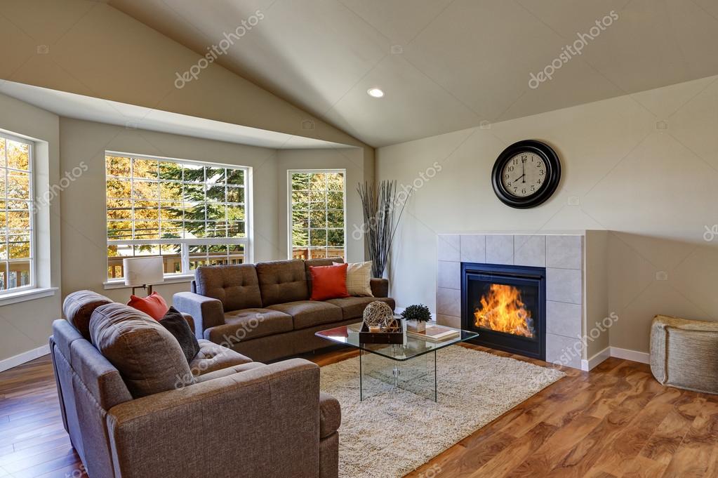 Vaulted Ceiling Living Room With Large Windows Stock Photo