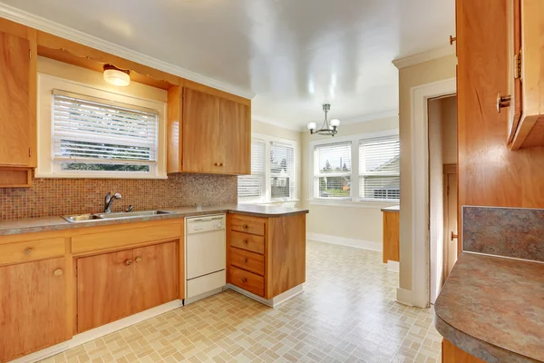 Nice bathroom with natural stone tiles and wood cabinet — Stock