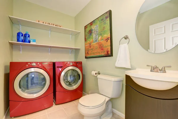 Interior of laundry room connected with half bathroom — Stock Photo, Image