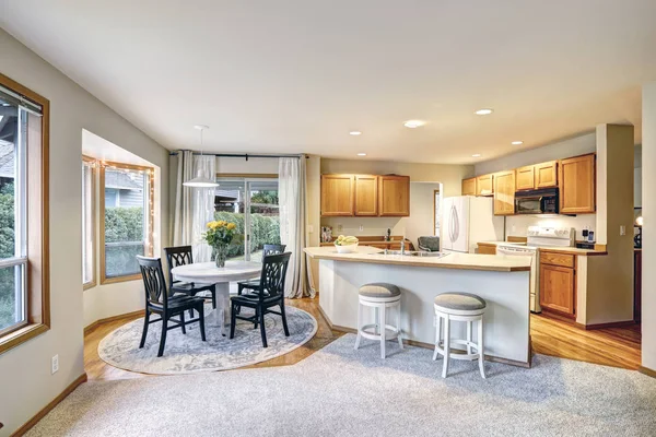 Traditional dining and kitchen room design in neutrals colors — Stock Photo, Image