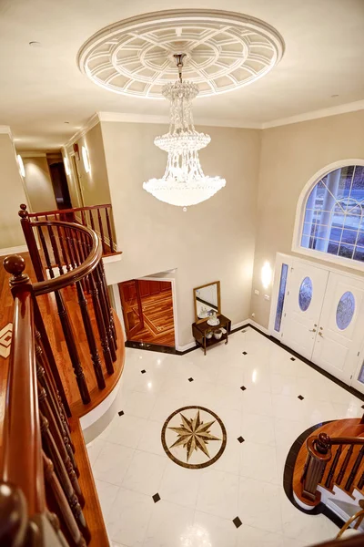 Panoramic view of spacious foyer from staircase landing — Stock Photo, Image