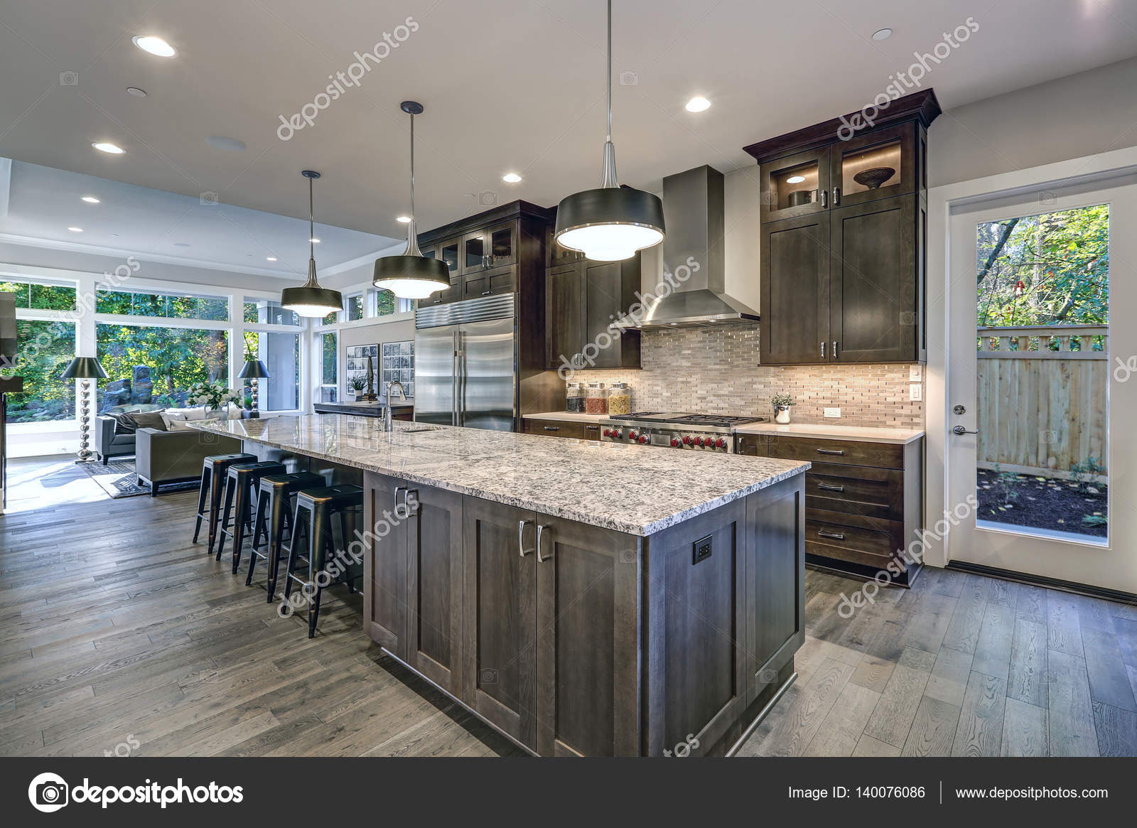 grey granite countertops with brown cabinets