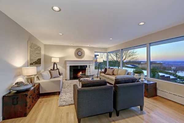 Warm light brown living room with panoramic window view. — Stock Photo, Image