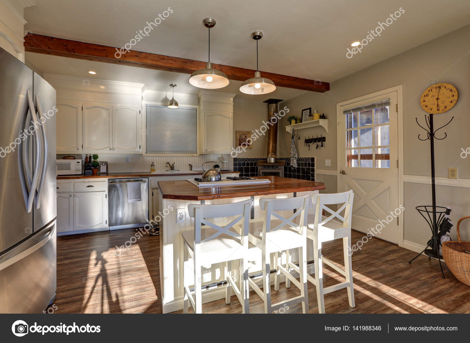 Newly Renovated Kitchen Boasts Wood Beams On Ceiling Stock Photo