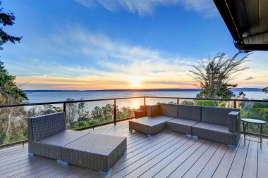 Modern two story panorama house with Puget Sound view clipart