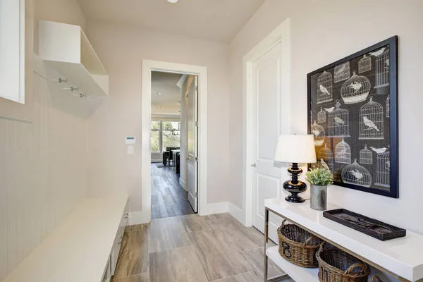 Pretty entrance foyer with an extra long built-in bench