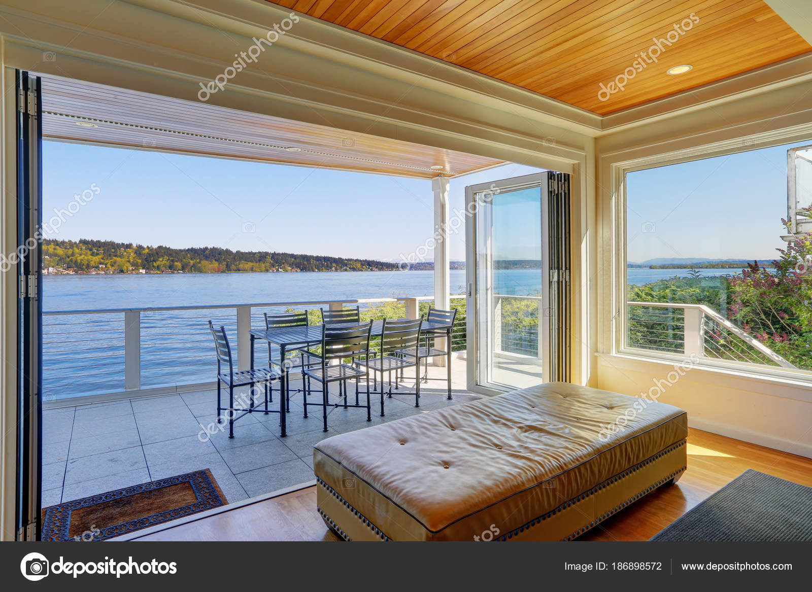 Lakefront Home Interior Shows The Covered Deck Stock Photo