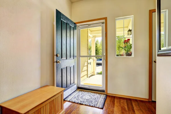 Small foyer with green open front door, — Stock Photo, Image