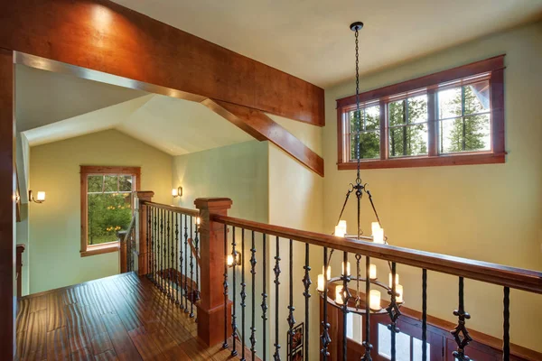 Second floor landing features stained handrails — Stock Photo, Image