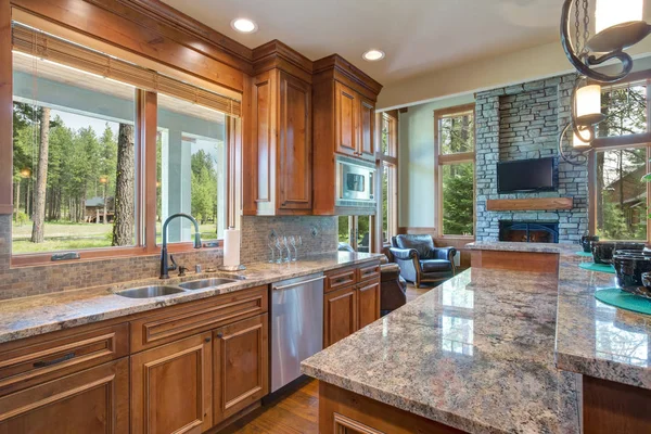 Gourmet kitchen boasts a curved kitchen hood — Stock Photo, Image