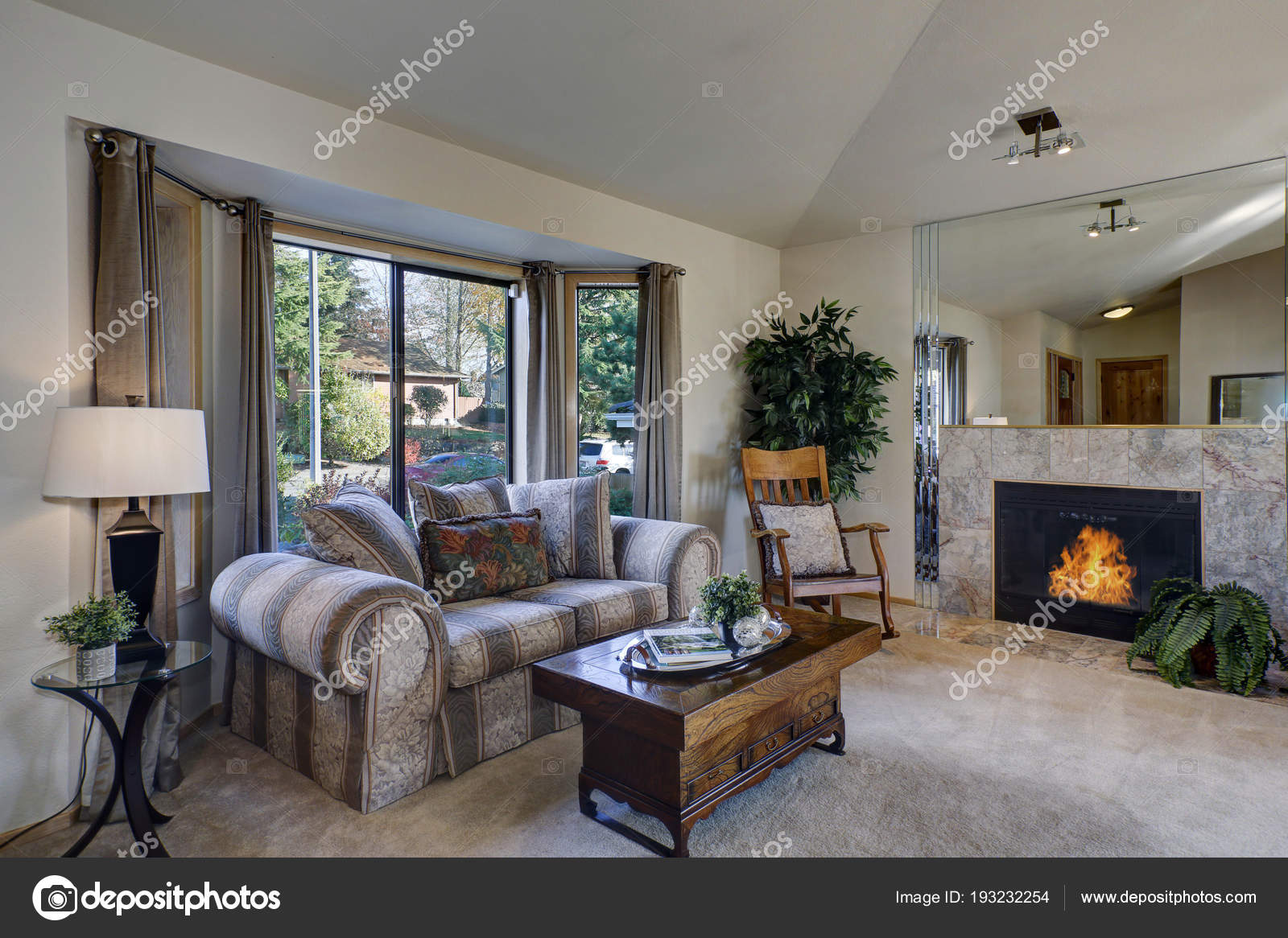 Light Filled Family Room With Vaulted Ceiling Stock Photo