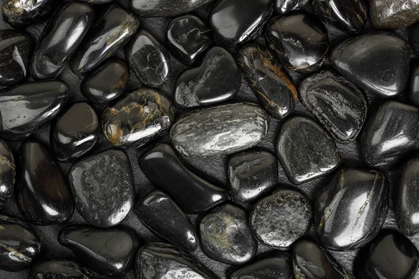 Svarta stenar bakgrund — Stockfoto