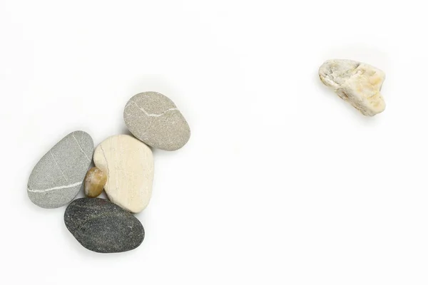 Beach stones on white — Stockfoto