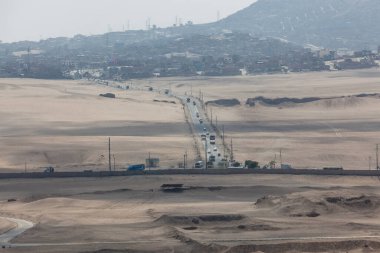 PACHACAMAC, LIMA / PERU - May 10 2016: View of the town of Pachacamac from the ancient ruins as a contrast for life in Pachacamac, Lima Peru.