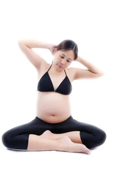 Bella giovane donna incinta isolata sullo sfondo bianco . — Foto Stock