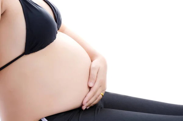 Schöne junge schwangere Dame isoliert auf dem weißen Hintergrund. — Stockfoto