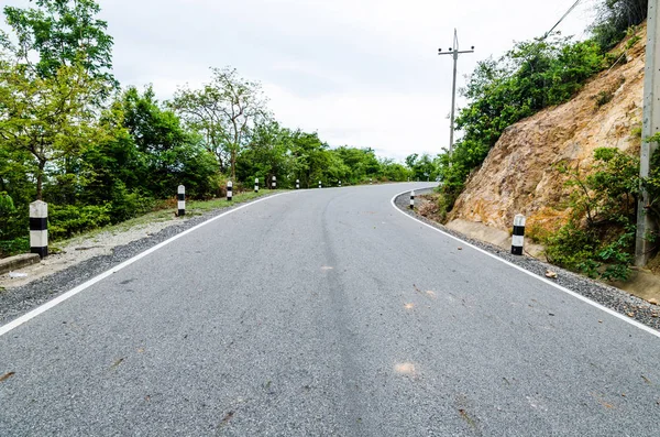 Long asphalt in the nature. — Stock Photo, Image