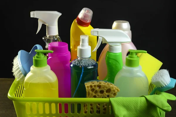 Various household chemicals on a black background — Stock Photo, Image