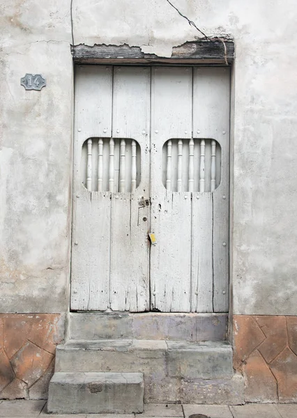 Cuban Colonial Architecture: Wooden House Door,  Camaguey, Cuba