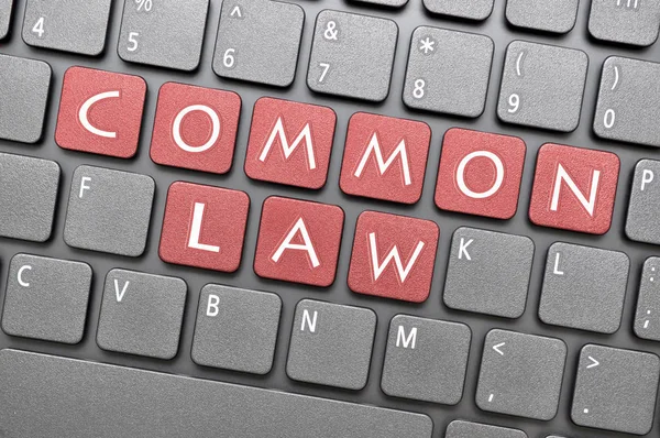 Common law key on keyboard — Stock Photo, Image