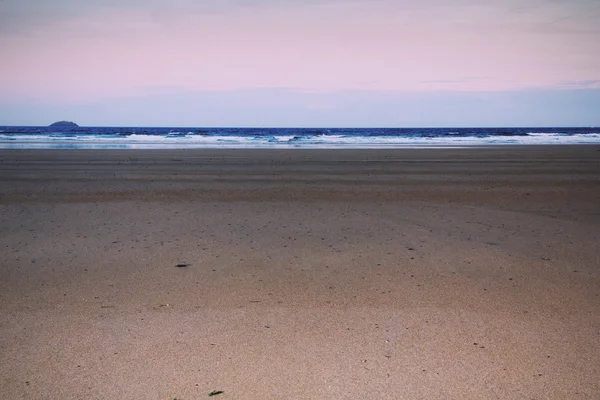 Vista de la mañana temprano sobre la playa en Polzeath Vintage Retro Filt —  Fotos de Stock