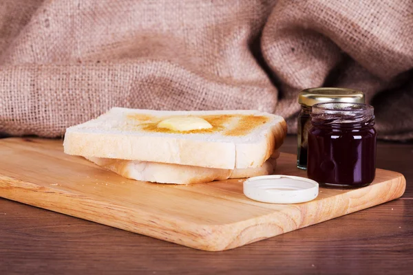 Slices of toast against a rustic background — Stock Photo, Image